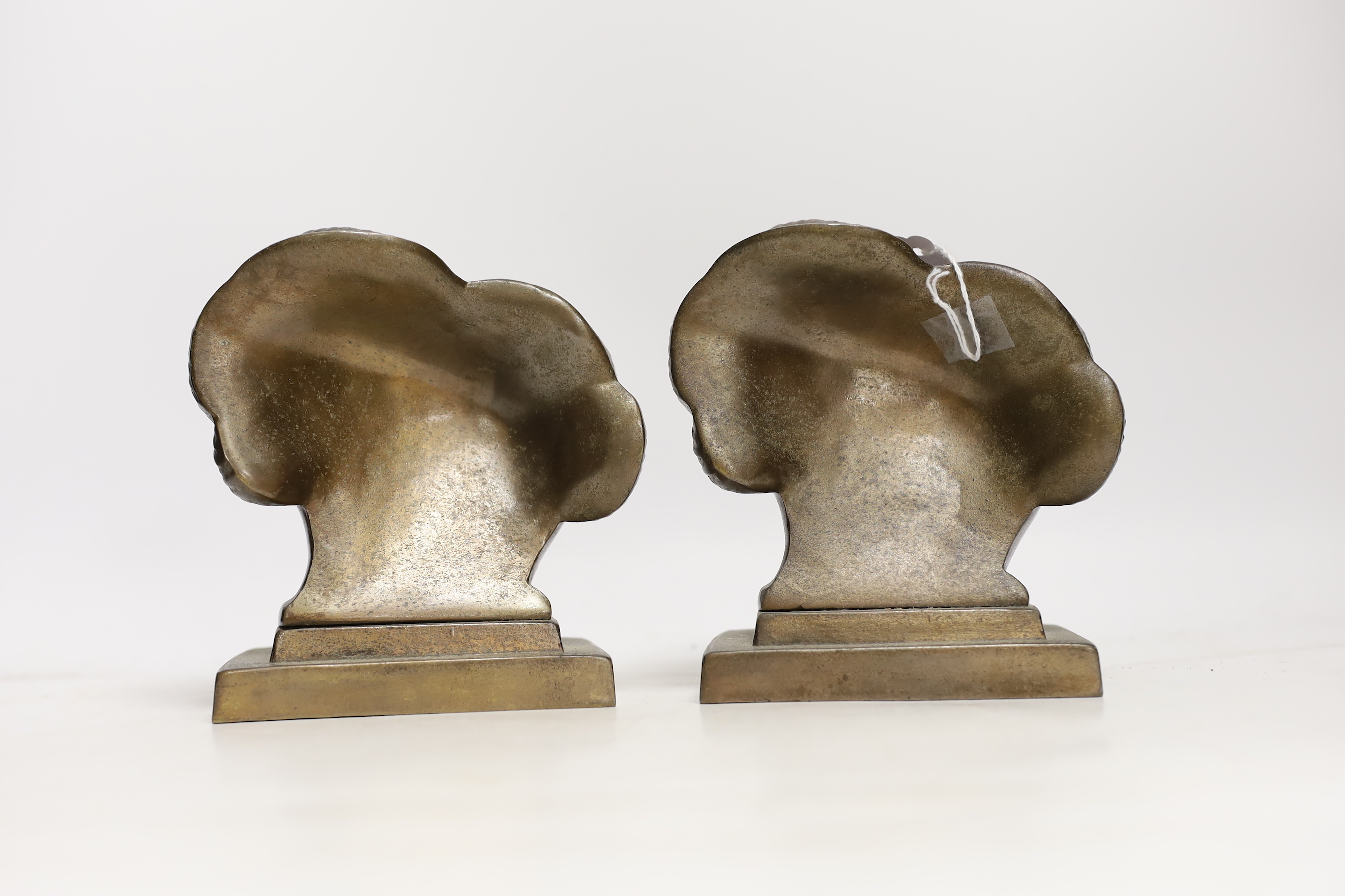 A pair of Art Deco Frankart Inc. patinated metal bookends, 16cm